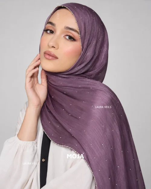 Woman wearing lavender Moja organza shimmer hijab, silver chain lace border, draped instant style
